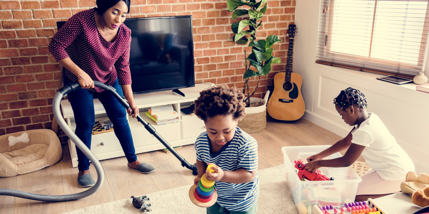 Quick Cleaning Hacks for Busy Families black-family-cleaning-the-house-together