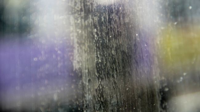 How to Clean a Glass Shower Door Without Streaks