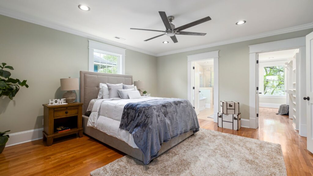 This Is How You Clean Your Ceiling Fans Without the Dust Storm